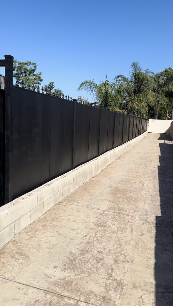 Freshly painted iron fence