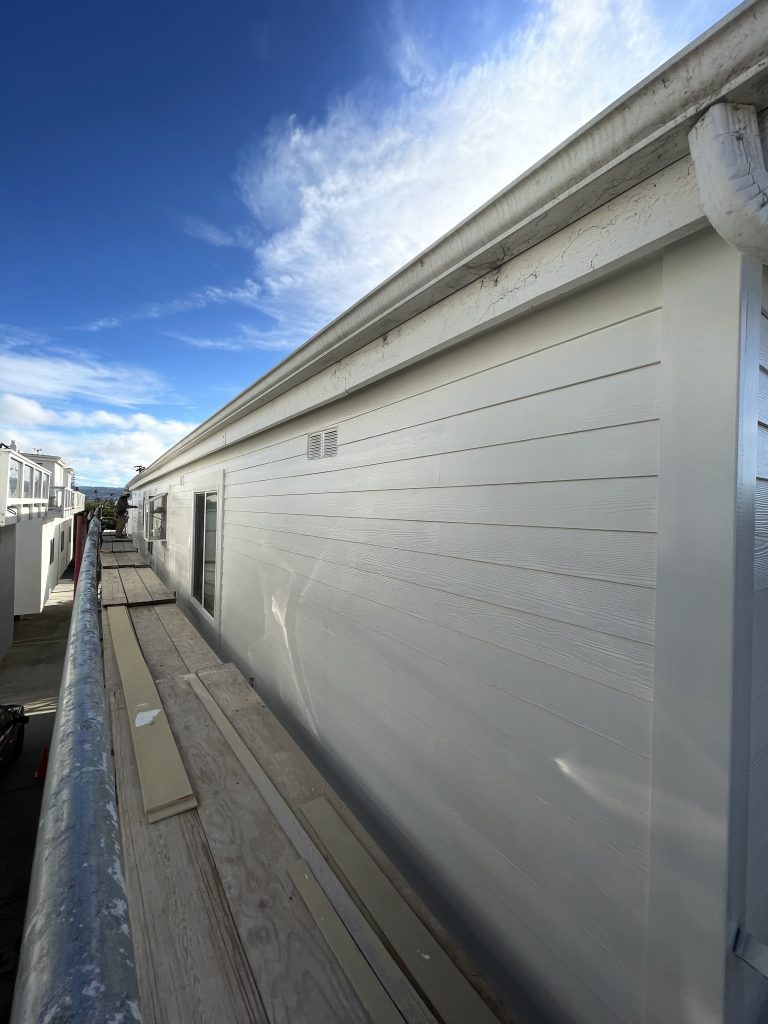 Image of prepped and painted siding 
