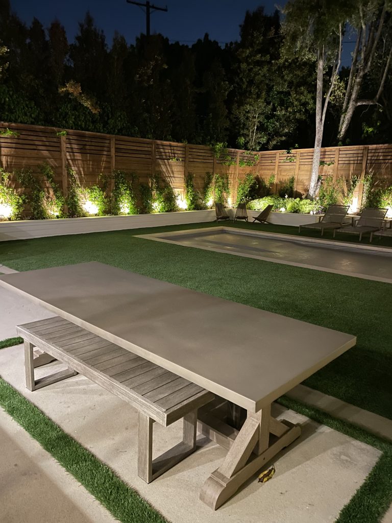 Image of a remodeled backyard at night