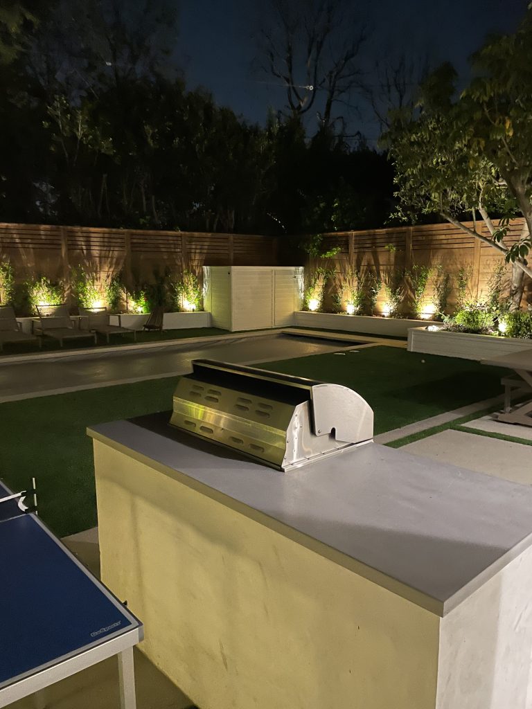 Image of a remodeled backyard at night
