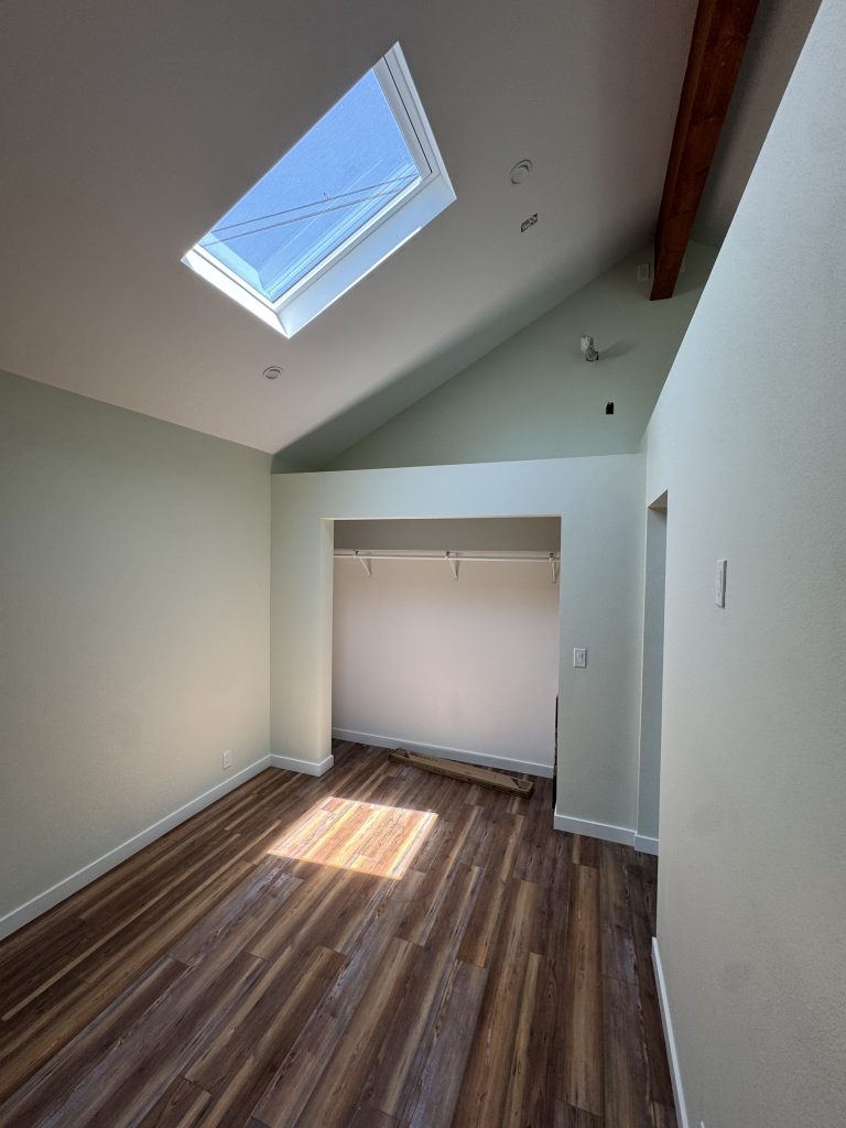 Image of a new bedroom including a sunroof